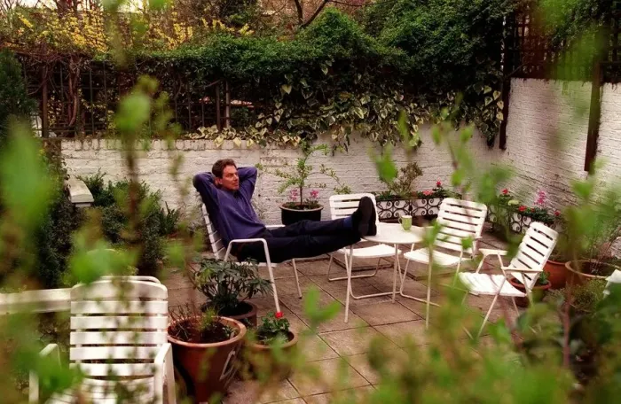 Framed Print : Tony Blair Labour Party leader at home resting in the garden sitting on chair Framed Print : Tony Blair Labour Party leader at home resting in the garden sitting on chair