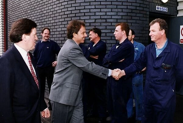Tony Blair Labour party leader shaking hands with Daily record employees at new cardonald