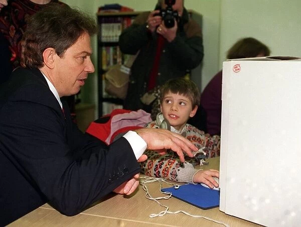 Tony Blair MP in Ayr with Stewart Welstead age 8 in the Cyber Centre playing with