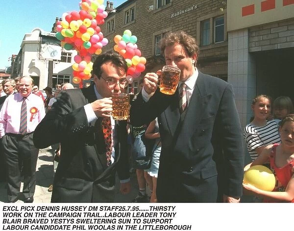 Tony Blair MP getting thirsty whilst working on the campaign trail