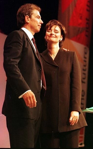 Tony Blair MP Prime Minister September 1999 on the platform with wife Cherie after