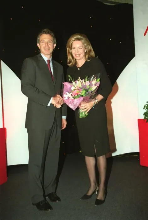 Framed Print : Tony Blair MP with Queen Noor of Jordan and bouqet May 1999 at The Mirror Pride of