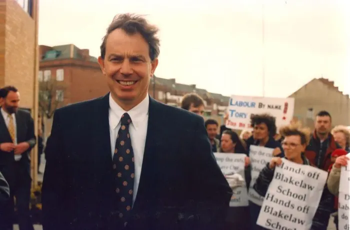 Framed Print : Tony Blair visits Benwell with Blakelaw School closure protestors in background
