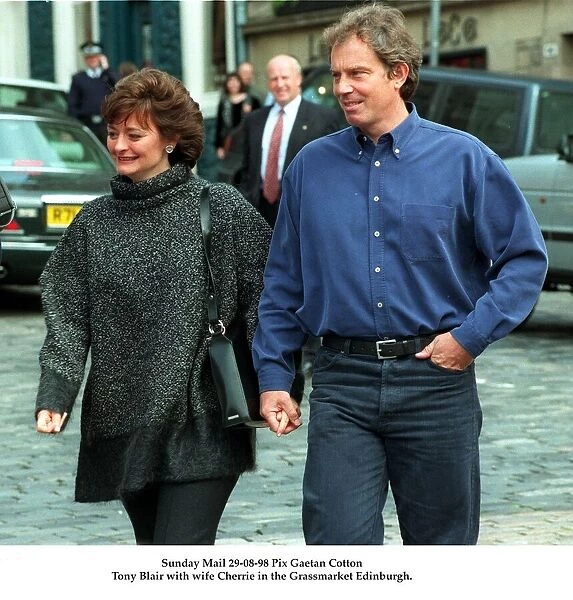Tony Blair and wife Cherie hand in hand August 1998 in the Grassmarket Edinburgh