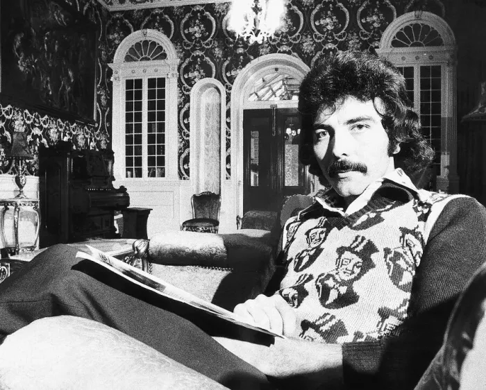 Framed Print : Tony Iommi Lead singer of pop group Black Sabbath at home October 1975 Framed Print : Tony Iommi Lead singer of pop group Black Sabbath at home October 1975