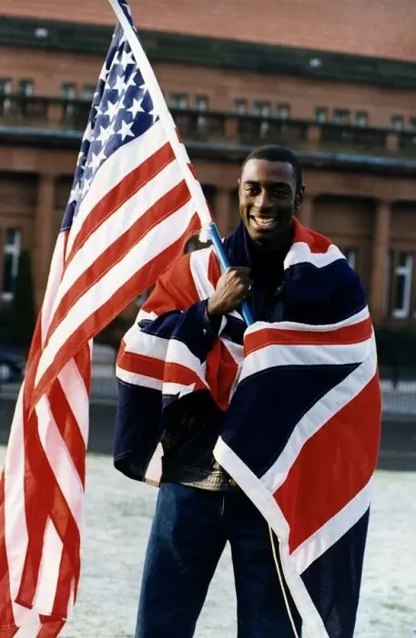 Framed Print : Tony Jarrett athlete runner with American and British flags at Kelvin Hall Glasgow Framed Print : Tony Jarrett athlete runner with American and British flags at Kelvin Hall Glasgow