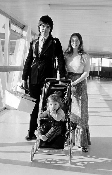 Tony Visconti with his wife Mary Hopkins and child - November 1973 at London Airport