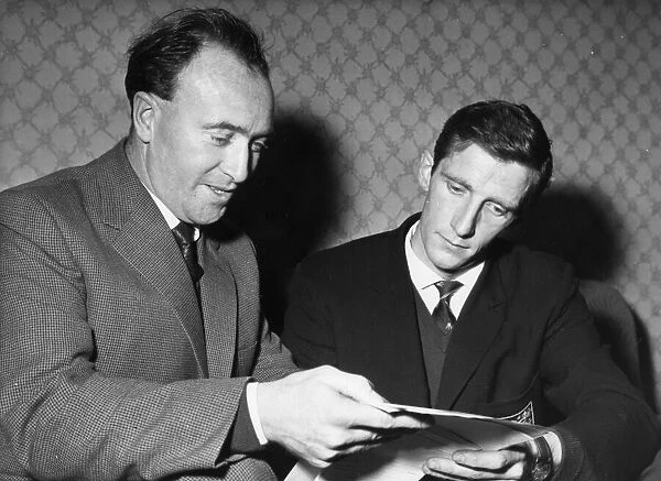Tony Waddington (left) Stoke City Manager with new signing Dennis Viollet after he