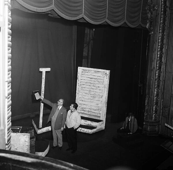 Tony Walton (right) working on stage at the Lyric Theatre, Hammersmith