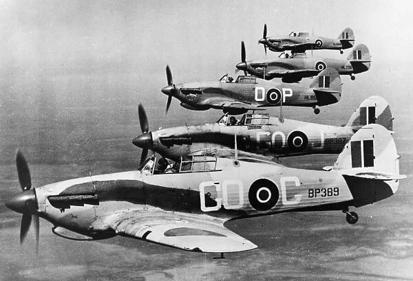 Five topicalised Hurricane Mark IICs of No. 94 Squadron RAF based at El Gamil, Egypt