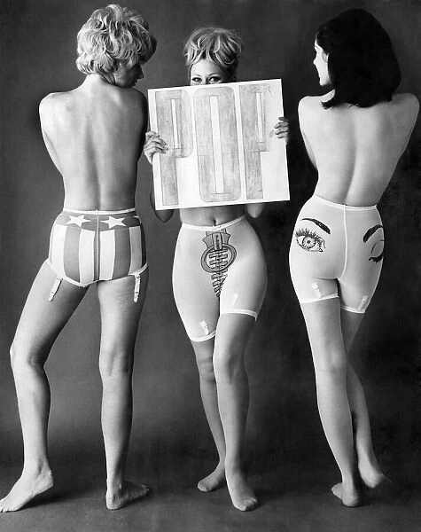 Three topless models wearing support pants. July 1965 P018253