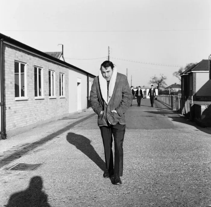 Framed Print : Tottenham and England footballer Jimmy Greaves wraps up against the cold on his way for a Framed Print : Tottenham and England footballer Jimmy Greaves wraps up against the cold on his way for a
