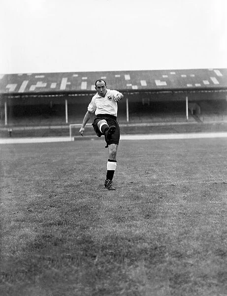 Tottenham Hostpur footballer Ron Burgess, pictured in training, August 1950