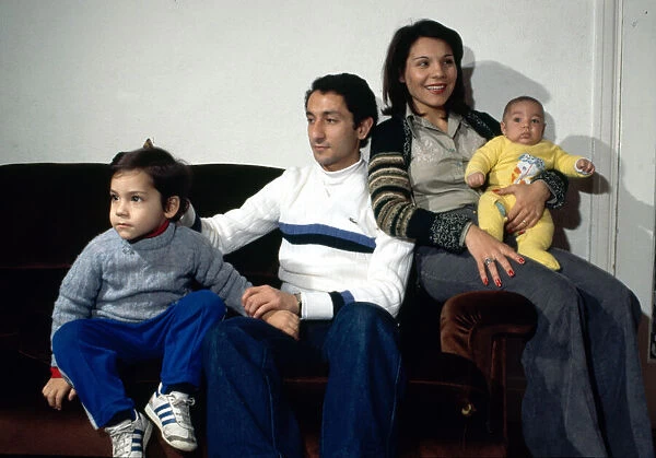 Tottenham Hotspur Argentine footballer Osvaldo Ardiles pictured at home with his wife