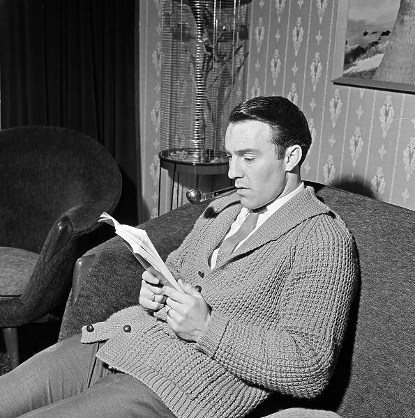 Tottenham Hotspur and England footballer Jimmy Greaves pictured smoking a pipe