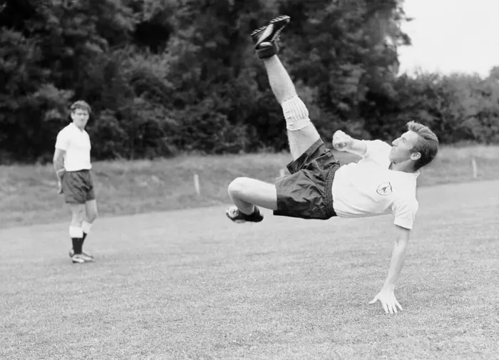 Framed Print : Tottenham Hotspur footabller Cliff Jones tries a spectacular overhead kick during a