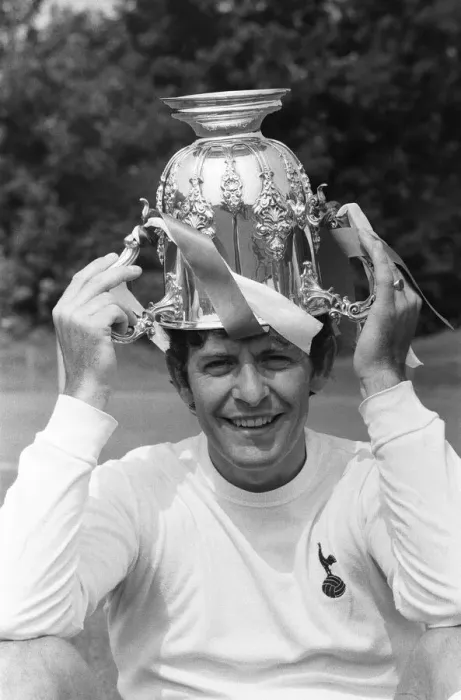 Framed Print : Tottenham Hotspur footballer Alan Mullery poses with the League Cup trophy upside down Framed Print : Tottenham Hotspur footballer Alan Mullery poses with the League Cup trophy upside down