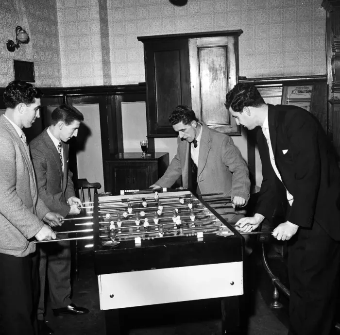 Framed Print : Tottenham Hotspur footballers enjoy a game of table football during a lunch time visit to