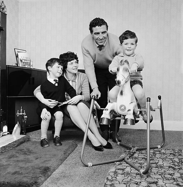 Tottenham Hotspur player Bobby Smith with wife and children at home. November 1960