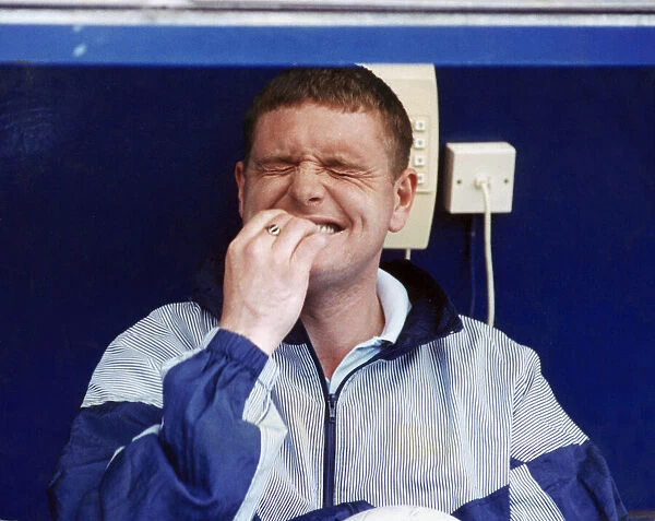 Tottenham Hotspur star Paul Gascoigne clowning around as he watches his teammates defeat