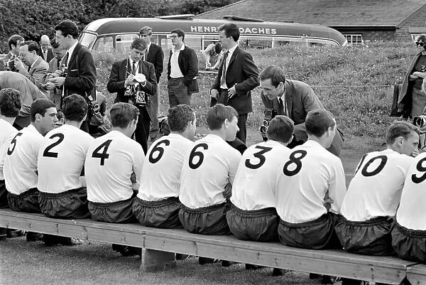 Tottenham Hotspur team having pictures taken by the press before a training session