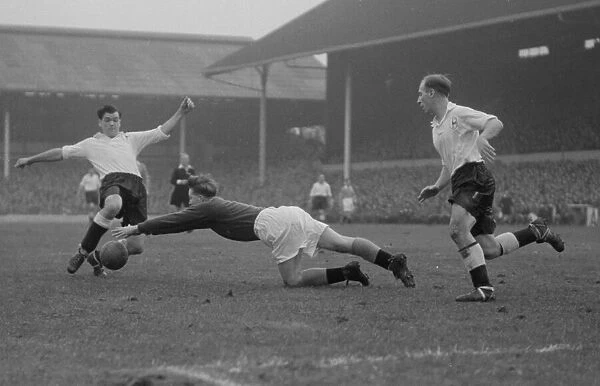 Tottenham Hotspur v Blackpool Division One. Blackpools goal keeper dives to the feet of