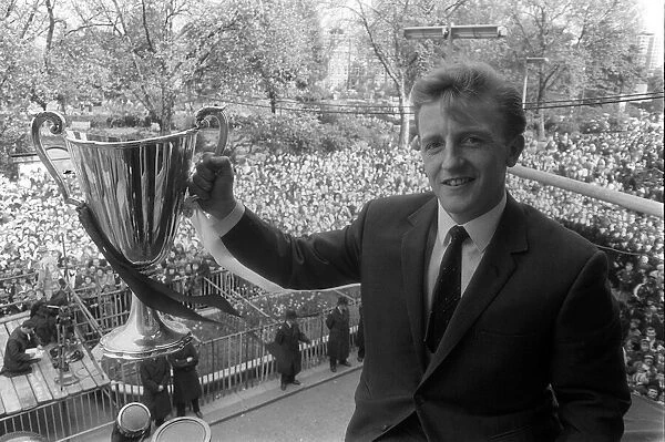 Tottenham Hotspurs Terry Dyson holding the European Cup Winners Cup Winners trophy