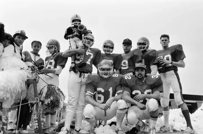 Framed Print : Toxteth Carnival, Liverpool, 9th July 1986. The Mersey Centurion American Football Team Framed Print : Toxteth Carnival, Liverpool, 9th July 1986. The Mersey Centurion American Football Team
