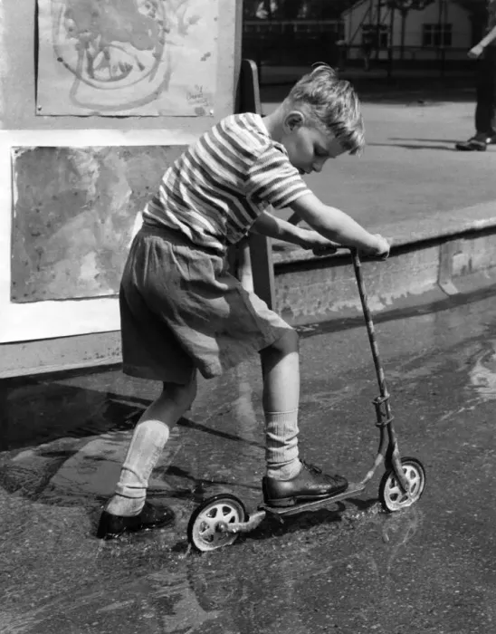 Framed Print : Toys Cycles and Scooters: One way to keep cool is to use the children Framed Print : Toys Cycles and Scooters: One way to keep cool is to use the children