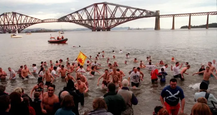 Framed Print : Traditional New year dip January 1999 in the waters off South Queensferry