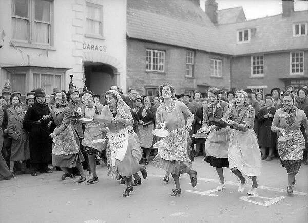 Traditional Pastimes The Olney Pancake Race Febuary 1956 The ladies start