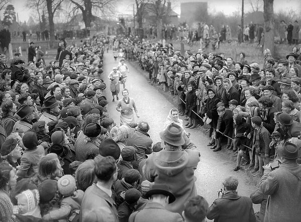 Traditional Pastimes The Olney Pancake Race Febuary 1956 The ladies get