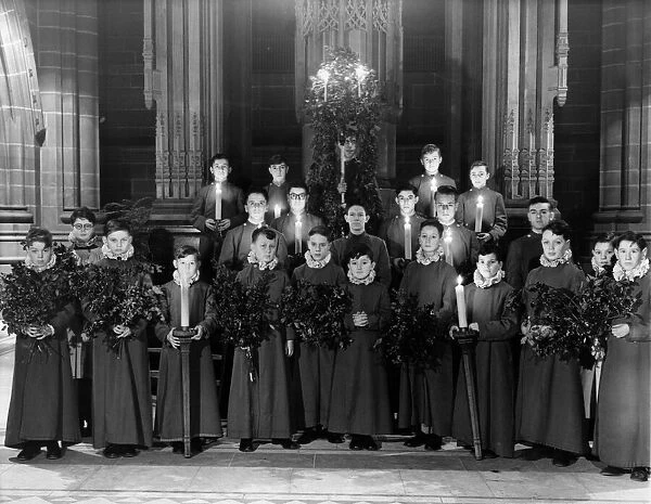 The traditional spectacle of Christmas, as choirboys and members of the Cross Guild of
