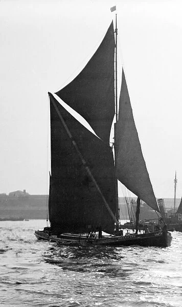 A traditional Thames barge seen here in the Lower Thames estuary circa 1935