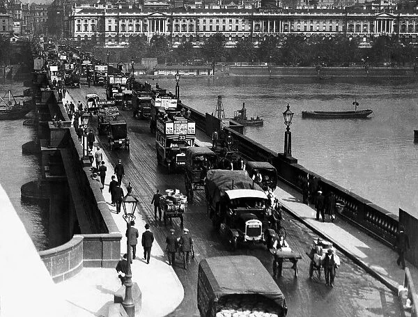 Traffic crossing the river Thames on the old Waterloo Bridge