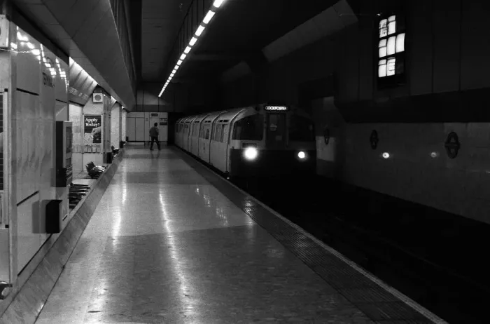 Framed Print : A train approaches the platform at Heathrow Airports terminal four tube station