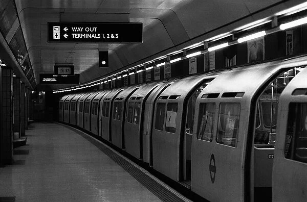 A train standing at the platform of Heathrow Airports terminal four tube station