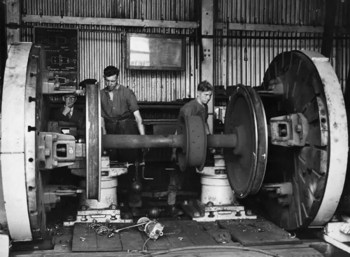 Framed Print : Trainees at a Royal Engineers Transportation training centre repair locomotive wheels in Framed Print : Trainees at a Royal Engineers Transportation training centre repair locomotive wheels in