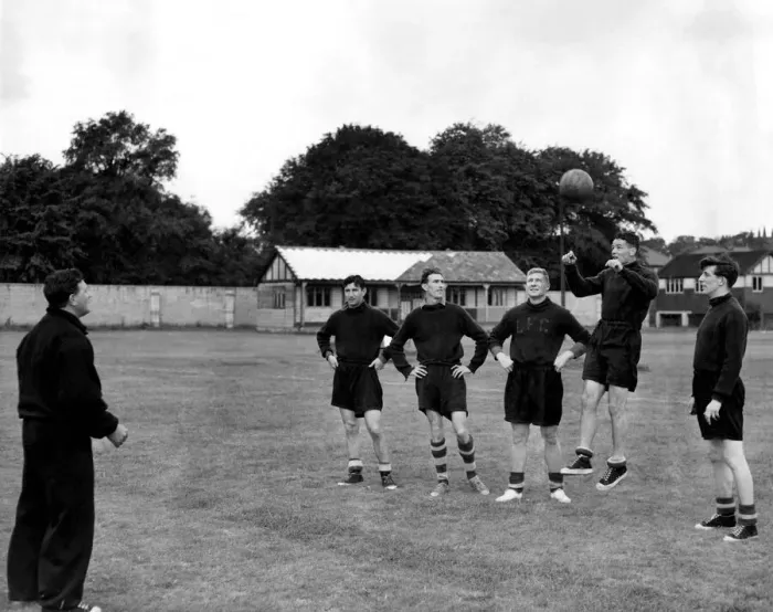 Framed Print : Trainer and coach Bob Paisley of Liverpool on the left putting some of the team member Framed Print : Trainer and coach Bob Paisley of Liverpool on the left putting some of the team member