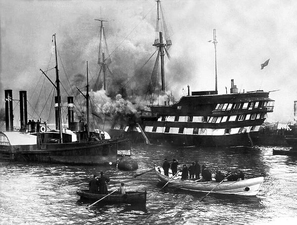 The training ship Wellesley on fire in the Tyne in 1914