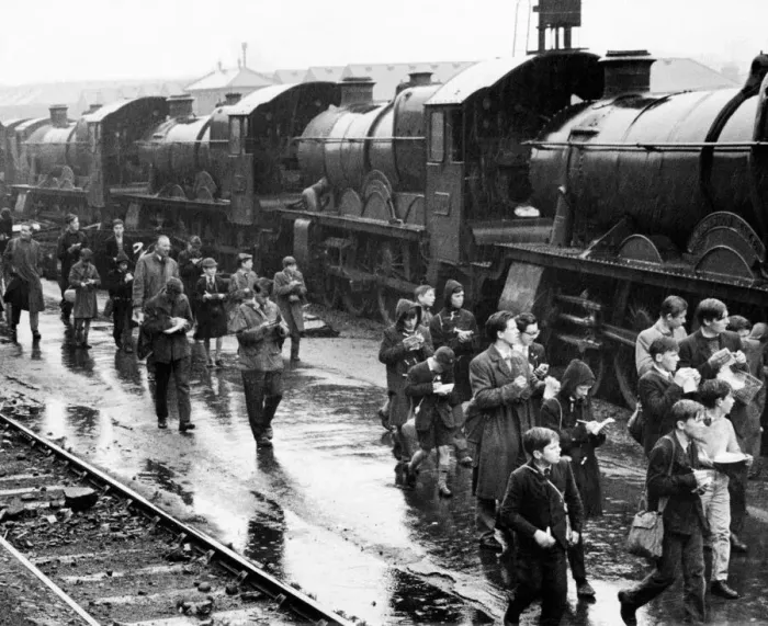 Framed Print : Trainspotters at railway station making notes on one of the steam locomotives, April 1961