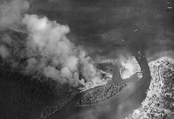 Framed Print : The trans-shipment base at Chumphon on the Kra Isthmus ablaze during a raid by RAF Framed Print : The trans-shipment base at Chumphon on the Kra Isthmus ablaze during a raid by RAF