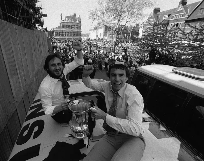Framed Print : Trevor Brooking and Frank Lampard hold the FA Cup on top of the parade coach on arriving Framed Print : Trevor Brooking and Frank Lampard hold the FA Cup on top of the parade coach on arriving