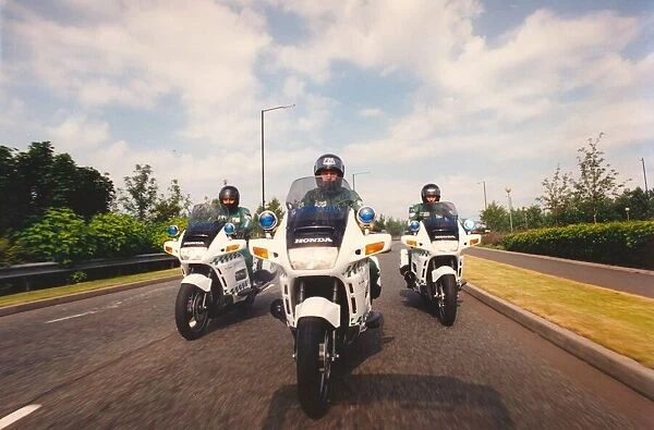 A trio of paramedics on motorcycles ready for the next call