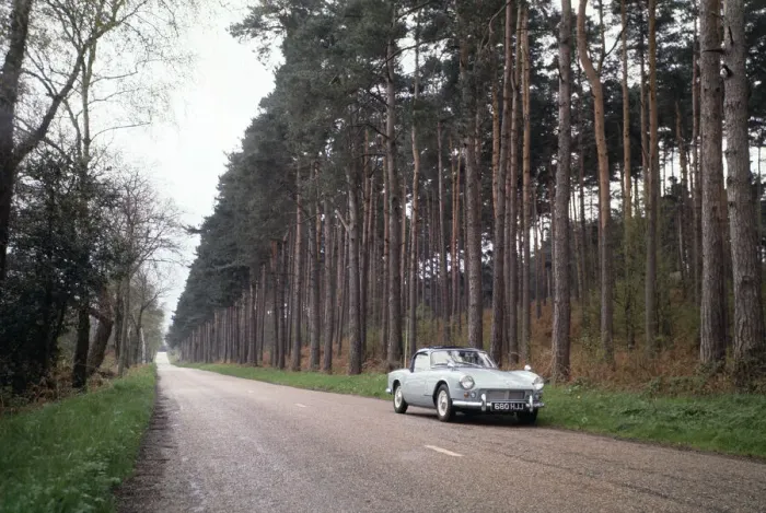 Framed Print : A Triumph Spitfire on a woodland road at Seale in Surrey. April 1964 Framed Print : A Triumph Spitfire on a woodland road at Seale in Surrey. April 1964