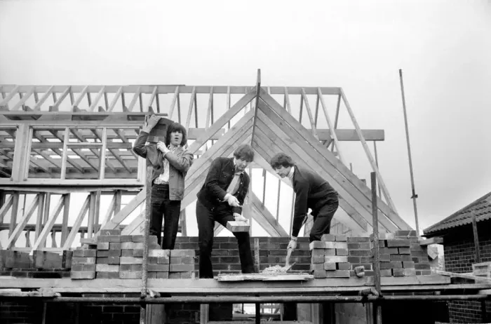 Framed Print : The Troggs, pop group help to build a house for one of their members Framed Print : The Troggs, pop group help to build a house for one of their members