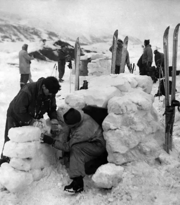 Framed Print : Troops busy cutting out the ice blocks and building the igloos which each houses two men