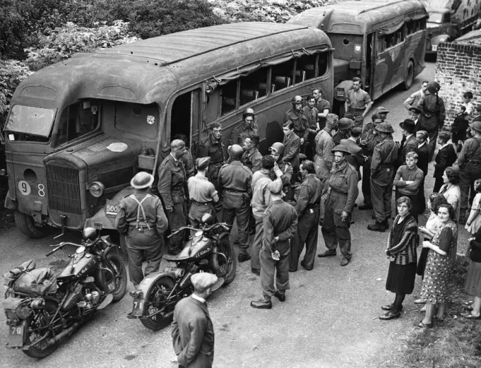 Framed Print : Troops enter their coaches after returning from the biggest ever Combined Operations