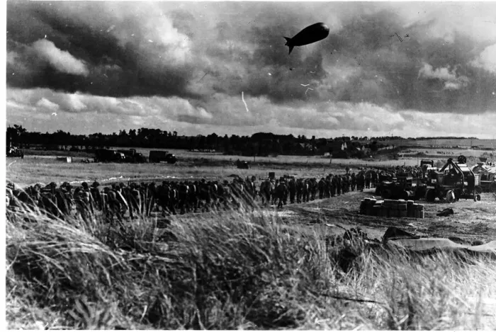 Framed Print : Troops in France march to the front line in 1944