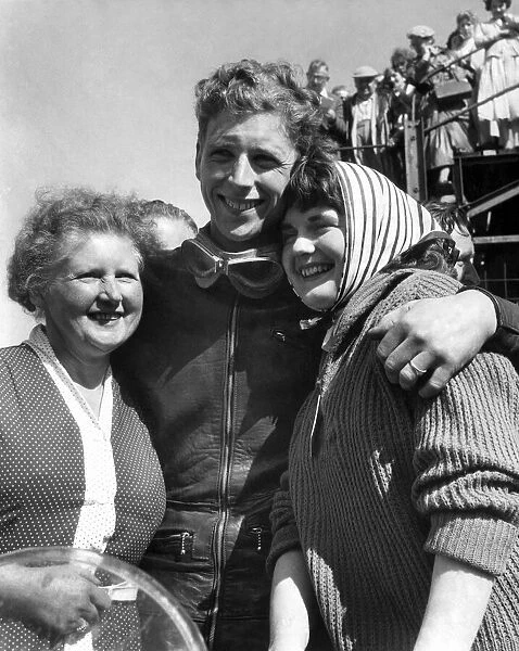 TT Races 1958: Winners Hug. Alan Shepherd hugs his wife, Ann, and his mother, Mrs